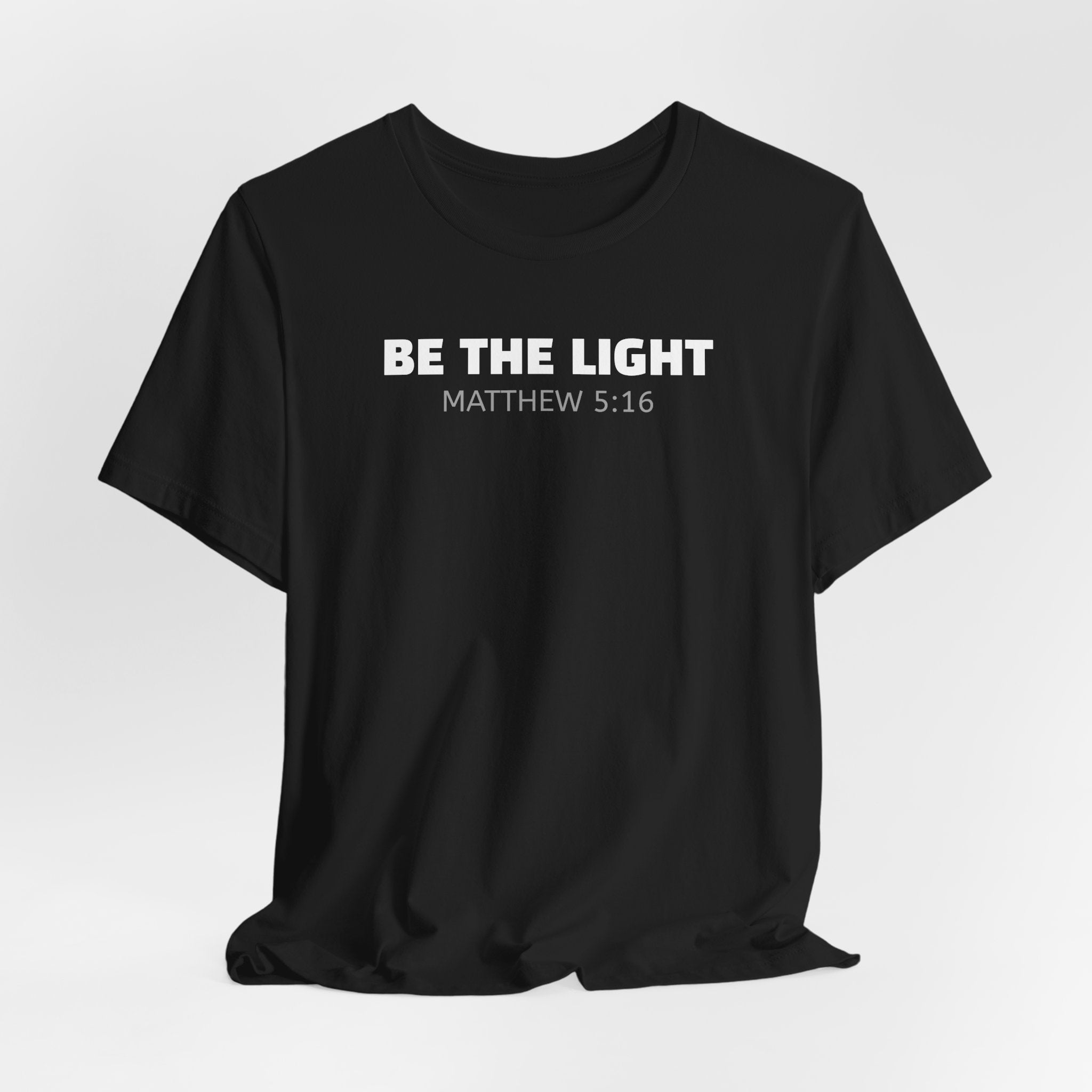 Be The Light  Matthew 5:16 — Minimalist Lightweight Christian Faith T-Shirt